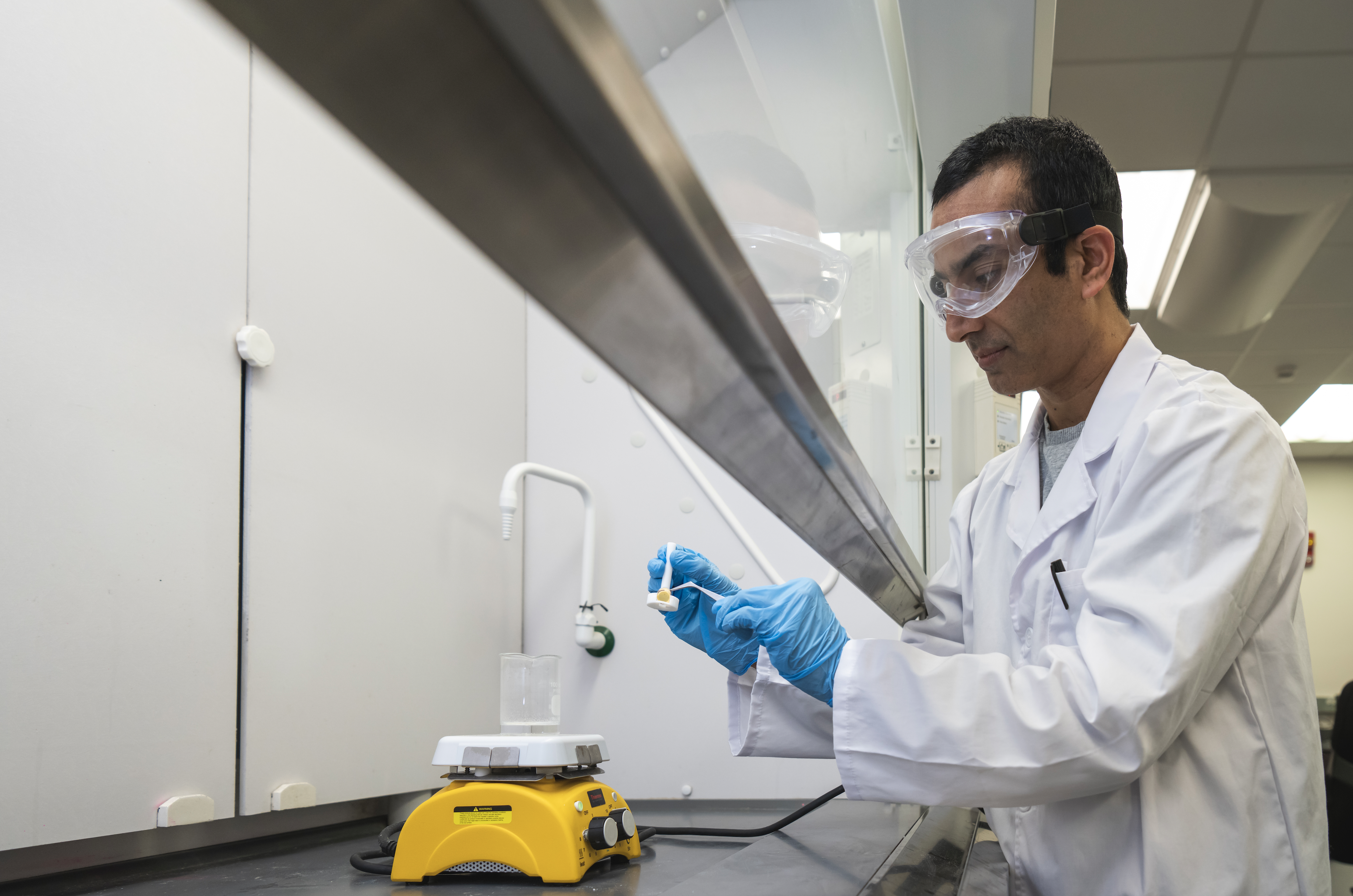 Man working in a chemical hood