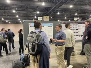 Alex presenting his poster at BPS