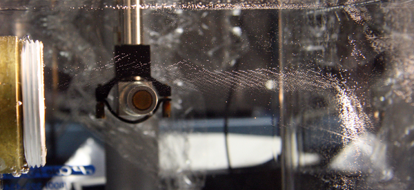 Transducer cavitating water