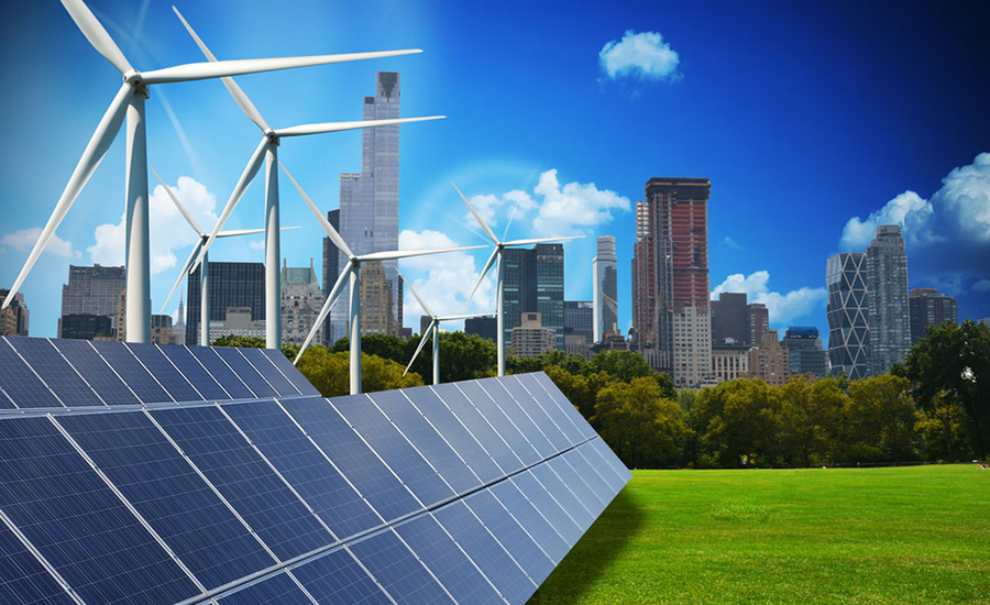 Solar panels and wind turbines in forefront, city skyline in background