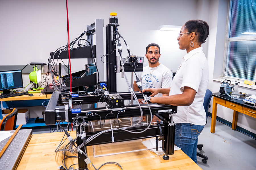 Scientists in an ultrasonics lab